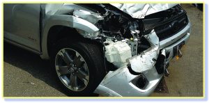 automobile damaged in severe crash - whole body injury concept image